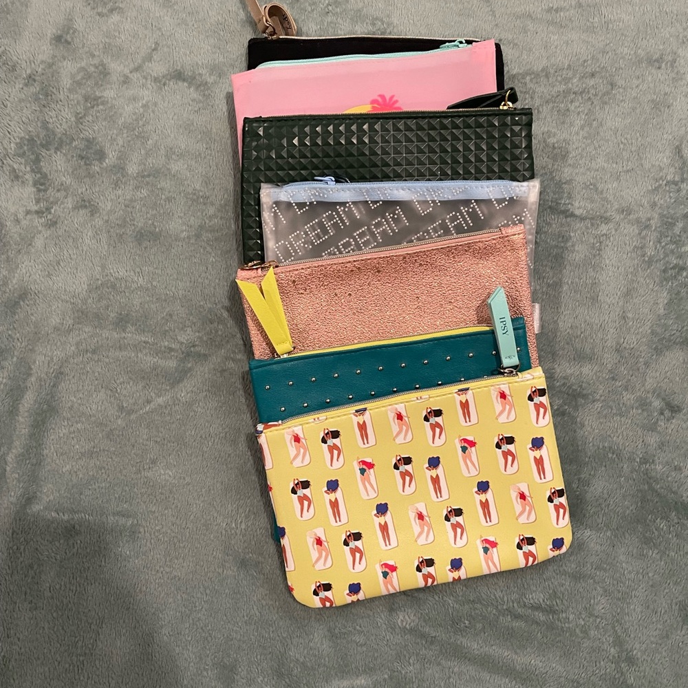 7 empty Ipsy bags